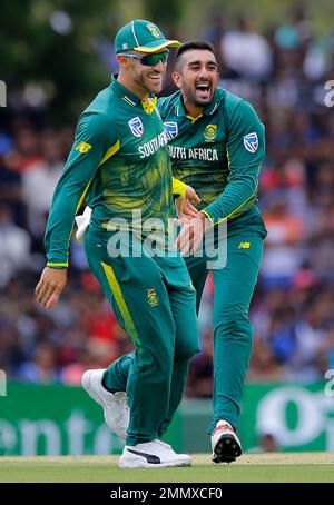 https://l450v.alamy.com/450v/2mmxcf0/south-africas-bowler-tabraiz-shamsi-right-celebrates-with-captain-faf-du-plessis-the-dismissal-of-sri-lankas-kusal-perera-during-their-first-one-day-international-cricket-match-in-dambulla-sri-lanka-sunday-july-29-2018-ap-photoeranga-jayawardena-2mmxcf0.jpg