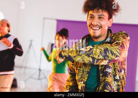 Image of group of group of diverse female and male hip hop dancers taking part in photo shot. Dance, rhythm, movement and training concept. Stock Photo