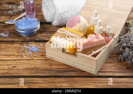 Natural handmade soap bars in box on wooden background Stock Photo