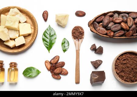 Composition with organic cocoa butter on white background, top view Stock Photo