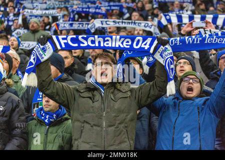 sports, football, Bundesliga, 2022/2023, FC Schalke 04 vs. 1. FC Koeln 0-0, Veltins Arena Gelsenkirchen, fun and enthusiasm at the Schalke football fans show their club scarf and sing their club song, DFL REGULATIONS PROHIBIT ANY USE OF PHOTOGRAPHS AS IMAGE SEQUENCES AND/OR QUASI-VIDEO Stock Photo