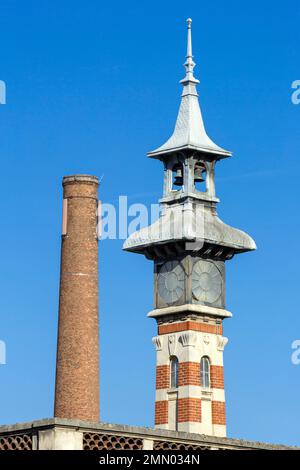 France, Meurthe et Moselle, Nancy, 38 meters high chimney made of red bricks and lantern tower of the former conciergerie of the Kronberg company which used to deliver coal to the town of Nancy from the end of the 19th century until after the first World war located Boulevard Lobau, the site has been converted into apartment buildings Stock Photo
