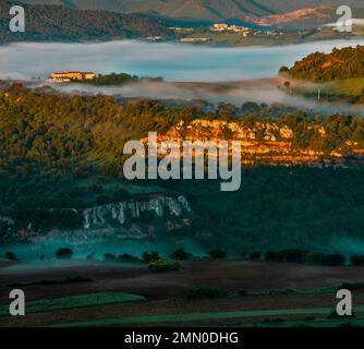 France, Aude, Rennes le Chateau, mountainous landscape at sunrise in a foggy atmosphere Stock Photo