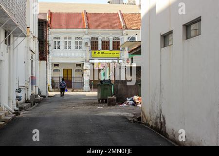 Georgetown, Penang, Malaysia - November 2012: A street lined with vintage colonial architecture in George Town in Penang. Stock Photo