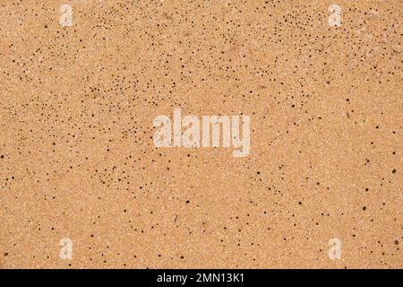 Sand orange, yellow, in a hole. Beautiful background and place for text. Copy space. High quality photo Stock Photo