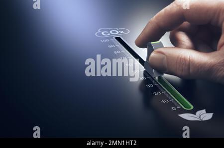 Hand using a slider to reduce CO2 emissions. Carbon free energy ...