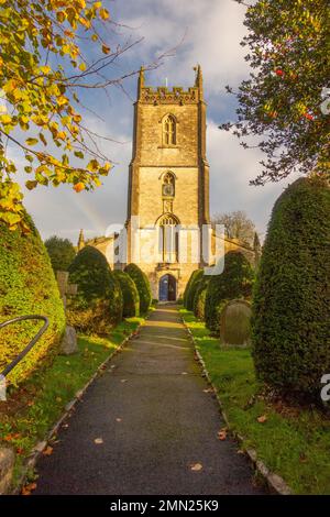 Looking up at the front of All Saints' Church, Nunney Stock Photo