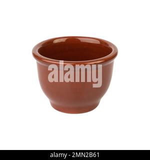 Rustic brown ceramic bowl isolated over white background. Stock Photo