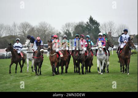 Race Three. The Glenfarclas Cross Country Chase.   The horses gather at the start    Horse Racing at Cheltenham Racecourse, Prestbury Park on Trials D Stock Photo