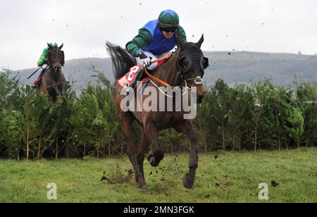 Race Three. The Glenfarclas Cross Country Chase.   Plan Of Attack ridden by Darragh O'Keeffe having cleared the last    Horse Racing at Cheltenham Rac Stock Photo