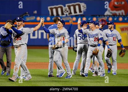 Miami Marlins left fielder Adam Duvall (14) and shortstop Miguel Rojas (19)  celebrate after Duvall's homer during a MLB game against the Los Angeles D  Stock Photo - Alamy