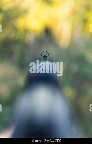 Gun Point Front view gun point of rifle machine gun. Firearm shooting and ...