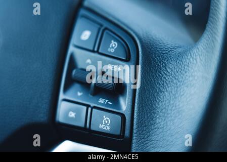 Steering wheel buttons for in-car options. Intended for greater comfort in the car. High quality photo Stock Photo