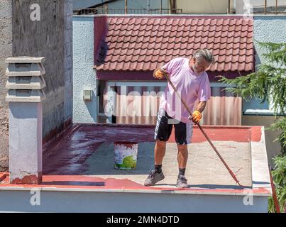 Building resins for waterproofing terraces, solving infiltration problems and making the surface walkable and aesthetically pleasing Stock Photo