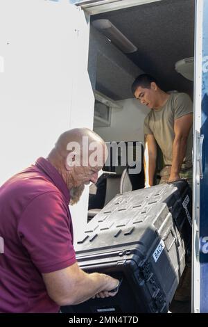 Airmen with the 255th Air Control Squadron, 172nd Airlift Wing, Mississippi Air National Guard, inspect and pack equipment at the Gulfport Combat Readiness Training Center, Gulfport, Miss., September 28, 2022. The Airmen are preparing to deploy to Florida in support of Hurricane Ian recovery. Stock Photo