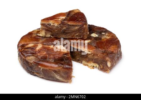 Round date bread with walnuts and a piece isolated on white background Stock Photo