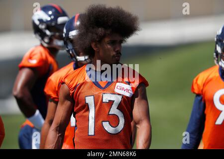 Denver Broncos wide receiver Kenny McKinley (11) is tackled by