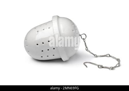 Single white ceramic tea strainer isolated on white background Stock Photo