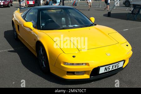 Three-Quarter Front View of a Yellow, 1996, Honda NSX, on display at the 2022 Silverstone Classic Stock Photo