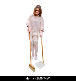 Woman sweeping floor with broom and dustpan while cleaning home living room, isolated on a white background Stock Photo