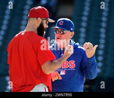 Philadelphia Phillies' Jake Arrieta, left, listens to former teammate  Chicago Cubs' Anthony Rizzo before a baseball game against the two clubs  Tuesday, June 5, 2018, in Chicago. (AP Photo/Charles Rex Arbogast Stock