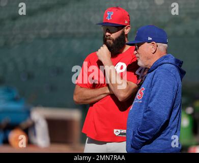 Philadelphia Phillies' Jake Arrieta, left, listens to former teammate  Chicago Cubs' Anthony Rizzo before a baseball game against the two clubs  Tuesday, June 5, 2018, in Chicago. (AP Photo/Charles Rex Arbogast Stock