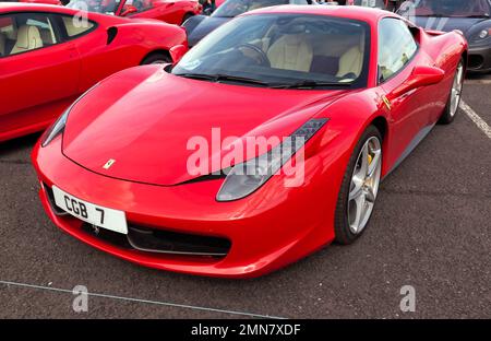 Three-Quarters Front View of a Red, 2012, Ferrari 458 Italia, on display at the 2022 Silverstone Classic Stock Photo