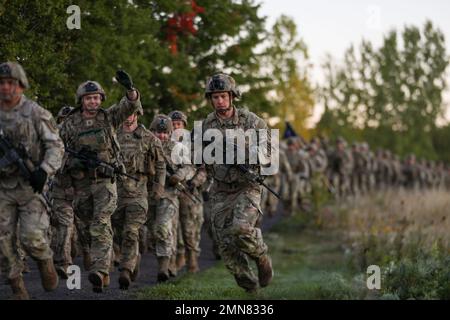 Today the 10th Mountain Division honored the Soldiers from Task Force 2-14 by participating in the Mogadishu Mile. The original mile was a route taken by Soldiers from a Blackhawk helicopter crash site to a rally point held by the 10th MTN DIV on National Street during the Battle of Mogadishu on October 4, 1993. Stock Photo