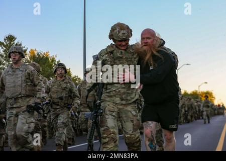 Today the 10th Mountain Division honored the Soldiers from Task Force 2-14 by participating in the Mogadishu Mile. The original mile was a route taken by Soldiers from a Blackhawk helicopter crash site to a rally point held by the 10th MTN DIV on National Street during the Battle of Mogadishu on October 4, 1993. Stock Photo