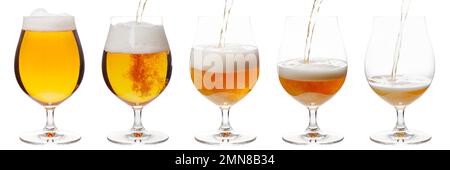 Lager of pilsner beer is pouring into snifter glass isolated on a white background Stock Photo