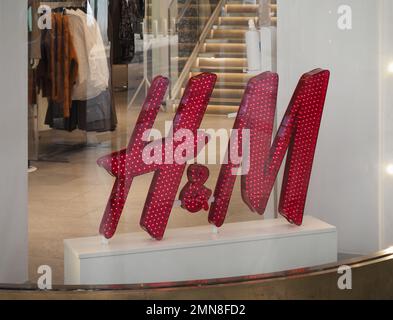 TURIN, ITALY - CIRCA SEPTEMBER 2022: H&M storefront sign Stock Photo