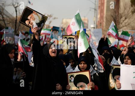 Tehran, Iran. 24th Jan, 2023. Iranian demonstrator students chant slogans during their protest against cartoons published by the French satirical magazine Charlie Hebdo that lampoon Iran's ruling clerics, in front of the French Embassy in Tehran, Iran. (Photo by Sobhan Farajvan/Pacific Press/Sipa USA) Credit: Sipa USA/Alamy Live News Stock Photo