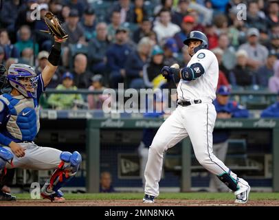 Seattle Mariners, from left, Taijuan Walker, James Paxton, Charlie Furbush  and Nelson Cruz show-off the team's new alternate Sunday uniforms during an  unveiling Friday, Jan. 23, 2015, in Seattle. The uniforms are