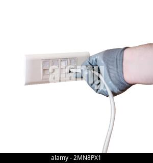 Connection to a computer network in the office, a gloved hand holds a cord for connecting to an Internet outlet, isolated on a white background. Stock Photo