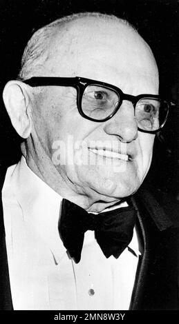 Owner-coach George Halas of the Chicago Bears announced the election of his  son George Mugs Halas Jr., 38 and shown at his desk in Chicago, as  president and general manager of the