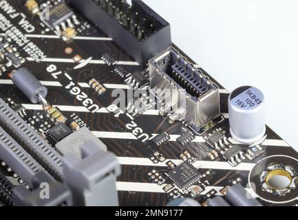 Close up USB type E female connector interface on modern high performance computer mainboard. Stock Photo