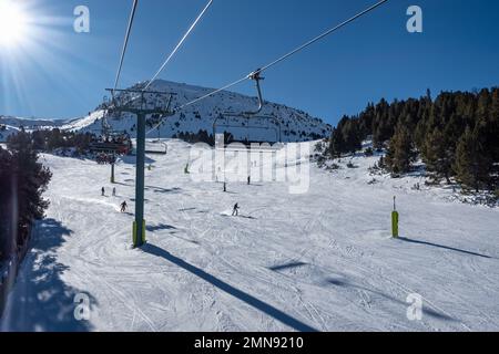 Panoramic view of a ski slope in the Pyrenees in Andorra, on sunny day and blue sky. Stock Photo