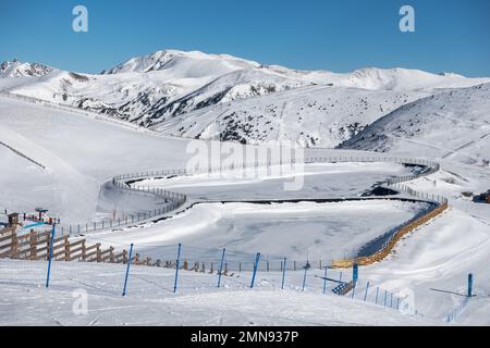 Panoramic view of the snowy slopes at the top of the ski resort of Grandvalira, Pyrenees, Andorra. Stock Photo