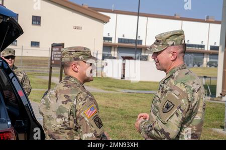 The command team from 311th Signal Command, which included Brig. Gen. Kevin Meisler and Command Sgt. Maj. Jonathan DeHart visited the 41st Signal Battalion and had the opportunity to to recognize and give coins to some soldiers there. Stock Photo