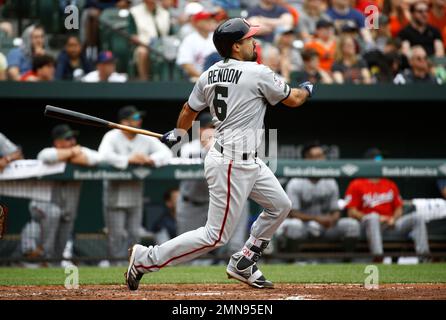 Washington Nationals Anthony Rendon watches the flight of a first