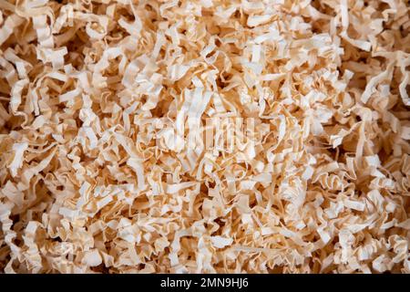background sawdust in open box for packing gifts on wooden box parcel Stock Photo