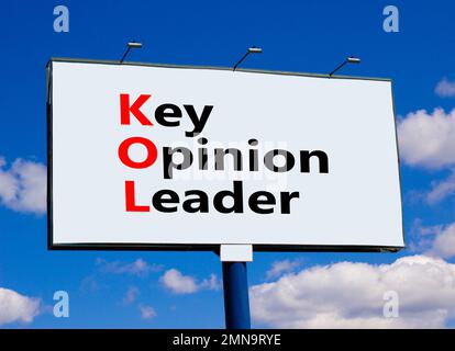 KOL key opinion leader symbol. Concept words KOL key opinion leader on big billboard on a beautiful blue sky and white clouds background. Business KOL Stock Photo