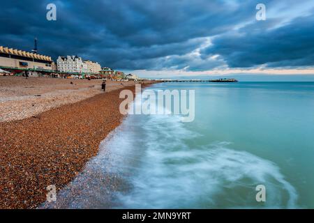 Ominous clouds over Brighton seafront at dusk, East Sussex, England. Stock Photo