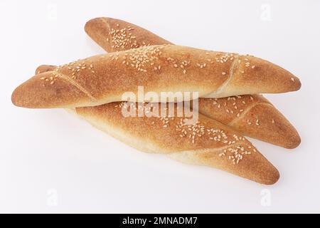 Freshly baked crusty homemade butter rolls or baked horns with eggs and cheese isolated on white background, traditional Bulgarian breakfast Stock Photo