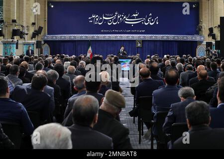 Tehran, Tehran, Iran. 30th Jan, 2023. This handout picture provided by the office of Iran's Supreme Leader Ayatollah ALI KHAMENEI shows him in a meeting with a large group of Iranian entrepreneurs, manufacturers, and knowledge-based companies in the Imam Khomeini Hussainiyah in Tehran on, January 30, 2023. The Leader of the Islamic Revolution stressed on ''rapid, continuous economic growth'' as the current necessity for the country. Khamenei announced that the bright future of the country is in need of rapid and continuous economic growth. The Leader explained the reasons and requirements fo Stock Photo