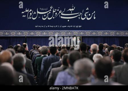 Tehran, Tehran, Iran. 30th Jan, 2023. This handout picture provided by the office of Iran's Supreme Leader Ayatollah ALI KHAMENEI shows him in a meeting with a large group of Iranian entrepreneurs, manufacturers, and knowledge-based companies in the Imam Khomeini Hussainiyah in Tehran on, January 30, 2023. The Leader of the Islamic Revolution stressed on ''rapid, continuous economic growth'' as the current necessity for the country. Khamenei announced that the bright future of the country is in need of rapid and continuous economic growth. The Leader explained the reasons and requirements fo Stock Photo