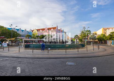 Beautiful colorful cityscape view of downtown Oranjestad on blue sky with puffy white clouds background. Oranjestad. Aruba. Stock Photo