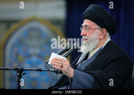 Tehran, Tehran, Iran. 30th Jan, 2023. This handout picture provided by the office of Iran's Supreme Leader Ayatollah ALI KHAMENEI shows him in a meeting with a large group of Iranian entrepreneurs, manufacturers, and knowledge-based companies in the Imam Khomeini Hussainiyah in Tehran on, January 30, 2023. The Leader of the Islamic Revolution stressed on ''rapid, continuous economic growth'' as the current necessity for the country. Khamenei announced that the bright future of the country is in need of rapid and continuous economic growth. The Leader explained the reasons and requirements fo Stock Photo