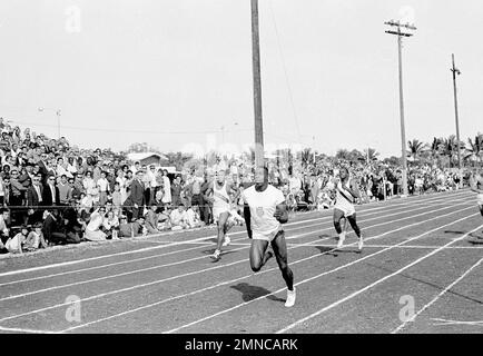 https://l450v.alamy.com/450v/2mncark/robert-hayes-of-florida-am-breaks-the-tape-winning-the-100-yard-dash-event-in-91-seconds-at-miami-jan-1-1964-equaling-his-own-world-record-hayes-ran-on-a-soggy-track-against-10-mile-crosswind-gusts-in-the-orange-bowl-track-meet-shown-finishing-behind-hayes-are-his-florida-am-teammates-grady-smith-left-and-bob-harris-right-ap-photo-2mncark.jpg