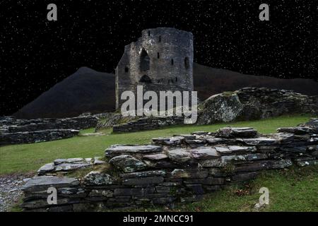 Dolbadarn Castle, in Snowdonia, was built in the 13th century by Prince Llywelyn the Great. The image has been modified to appear at night time. Stock Photo